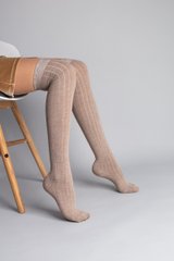 Гольфи жіночі трикотажні бежевого кольору за коліно